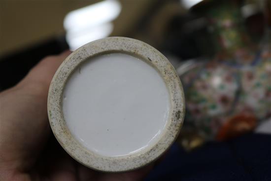 A Japanese Kutani porcelain lion dog candlestick, enamelled and gilt decoration and a Canton vase candlestick height 10cm